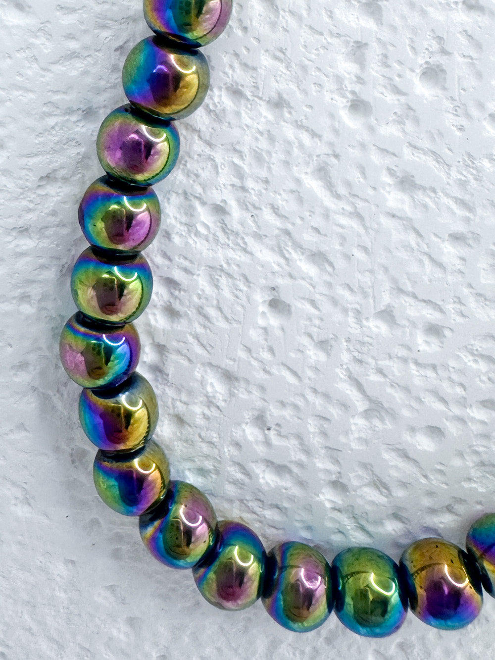 Rainbow hematite and gold steel necklace