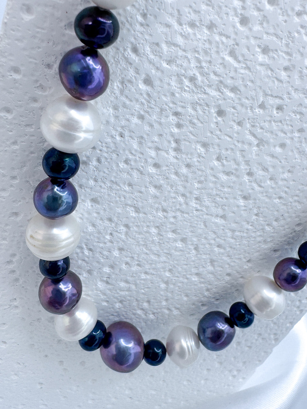 White, purple and black pearl necklace