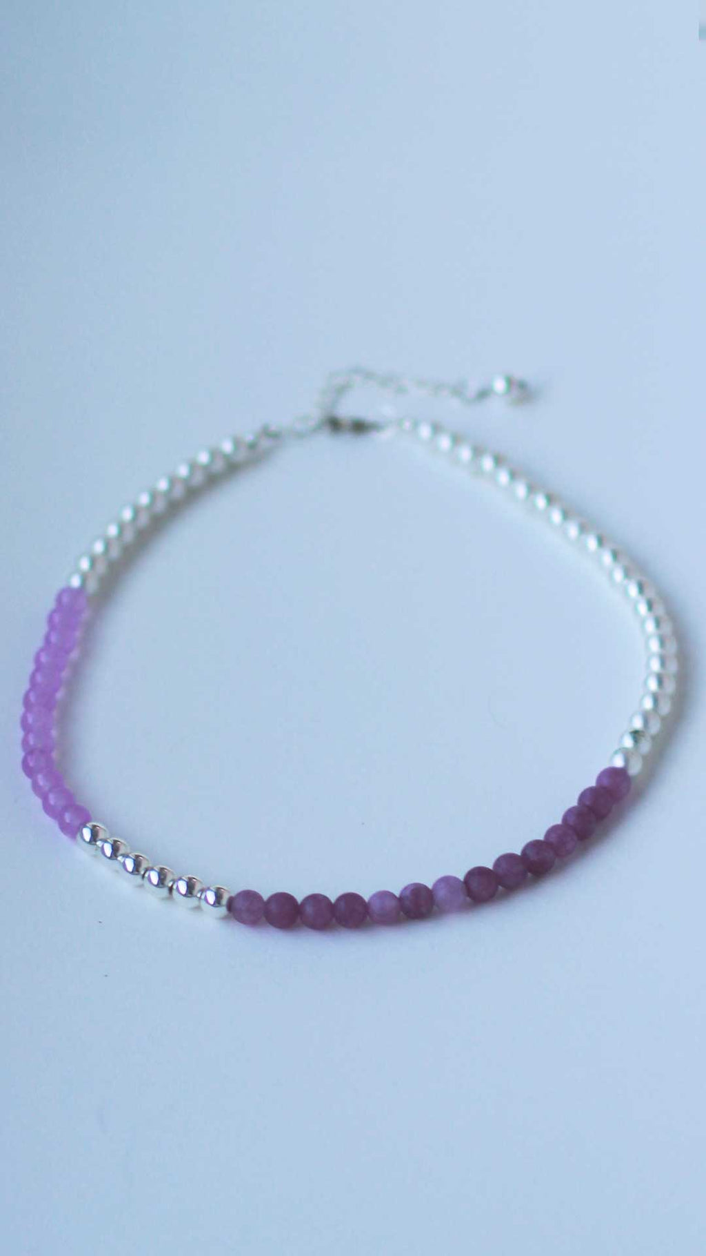 Violet and lilac beaded necklace in modern colour-block design