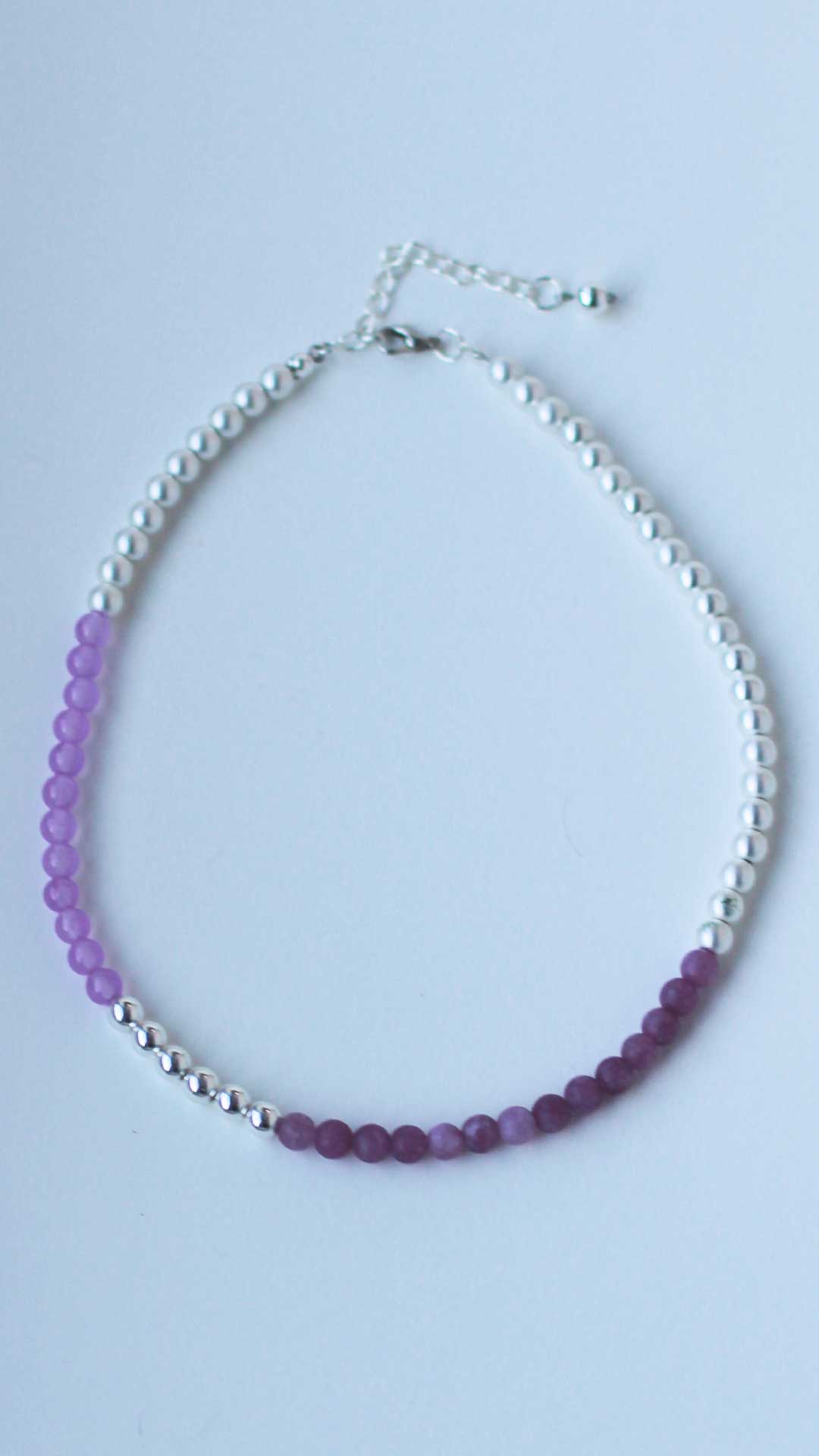 Violet and lilac beaded necklace in modern colour-block design