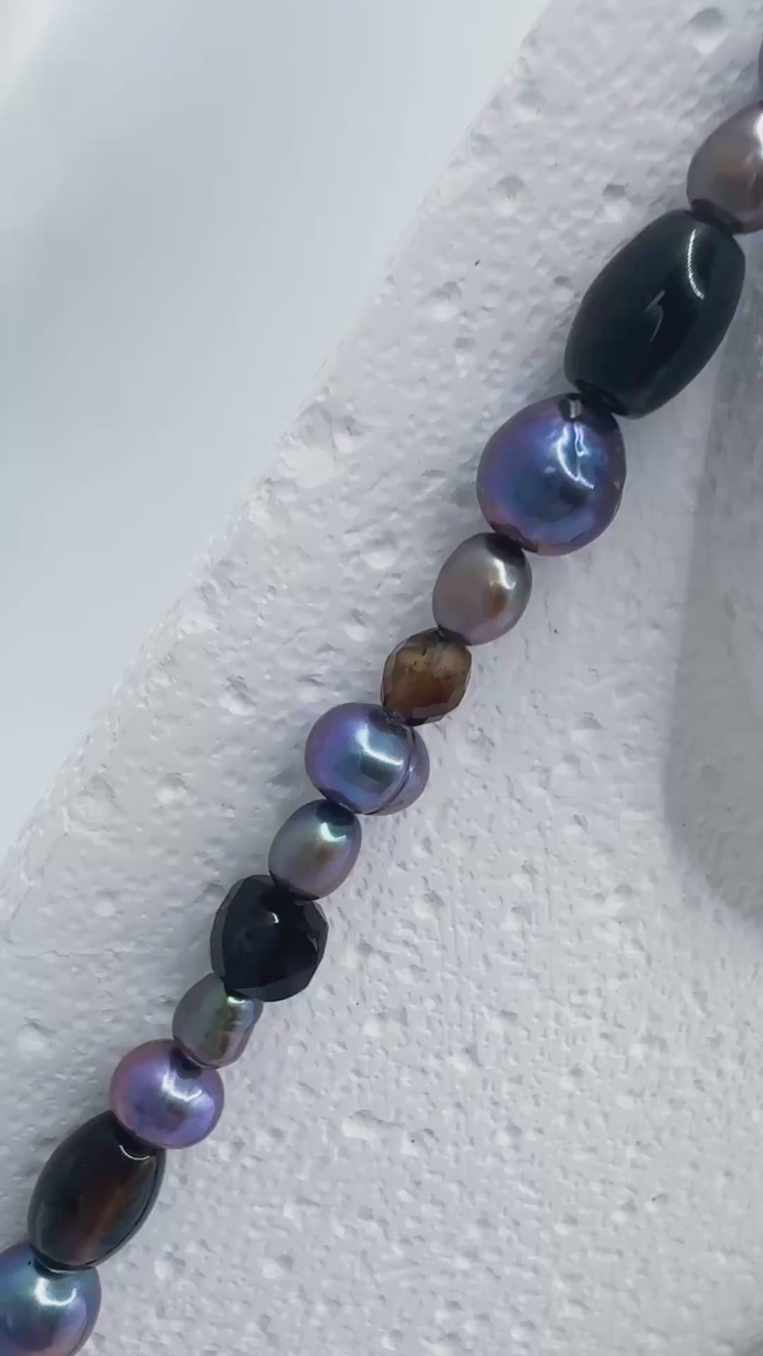 Full view and close ups of agate and pearl beads within iridian's purple pearl, agate and sterling fully beaded necklace on a white bust