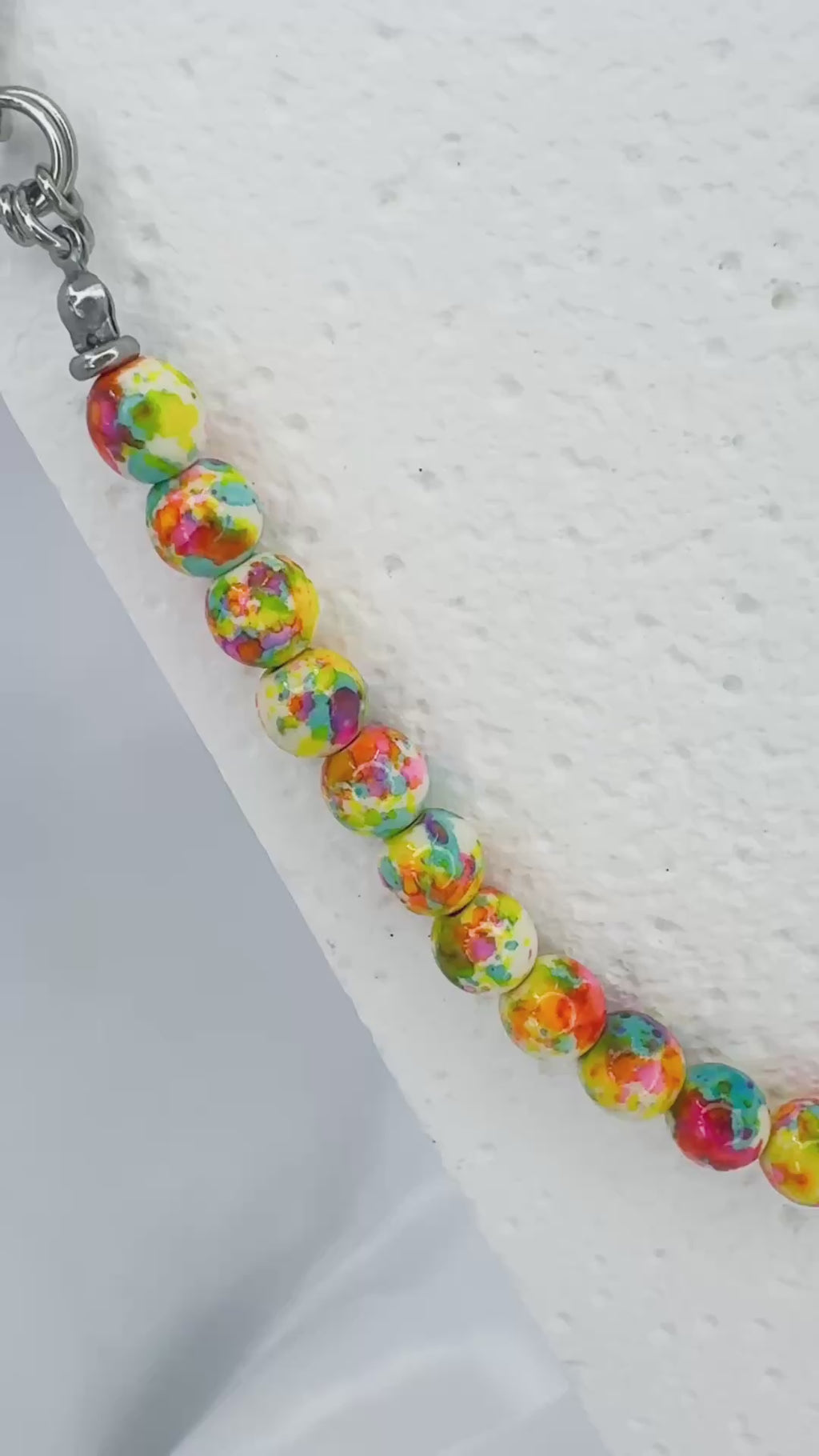 Neon splatter beads and steel necklace